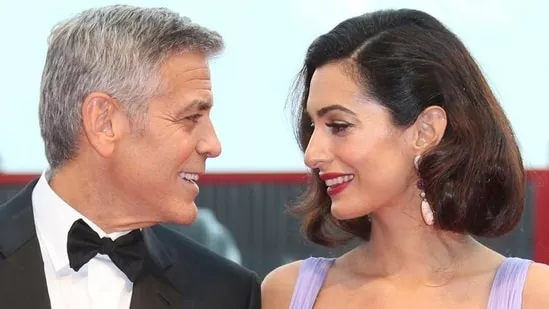 George Clooney, Amal Clooney, marriage, work-life balance, separate lives, Broadway, human rights lawyer, work commitments, Hollywood couple, relationship strain