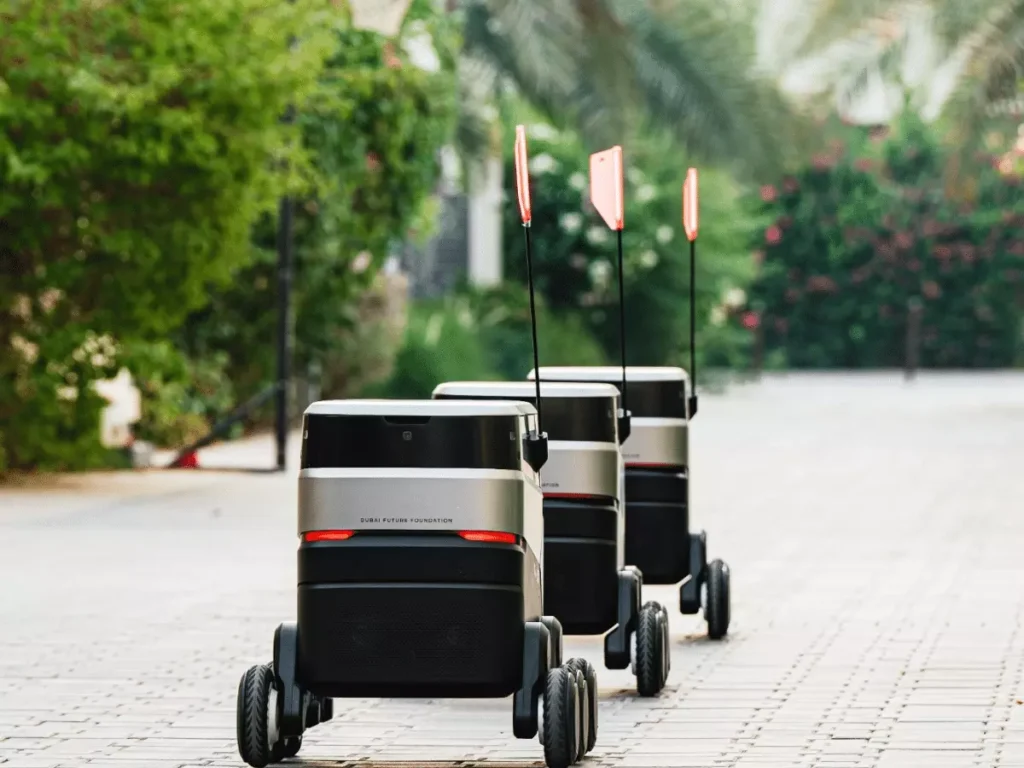 Dubai delivery robots Dubai Sustainable City autonomous delivery robots eco-friendly delivery robots food delivery robots grocery delivery robots Dubai Future Labs Lyve Global autonomous logistics Dubai green initiatives sustainable delivery solutions Dubai Future Foundation innovative delivery technology smart logistics solutions autonomous transportation 2030 autonomous trips