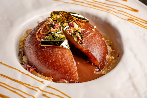 Dhaba Lane Choco Lava Jamun International Chocolate Day July 7th Punjabi Restaurant Gulab Jamun Warm Spongy Dessert Molten Chocolate Sweet Syrup AED 28 Homey Comfort Chocolatey Indulgence Online Orders One Day Only Celebrate Unforgettable Treat Esteemed Punjabi Restaurant Traditional Cuisine Modern Techniques Lamb Cutlets Smoked