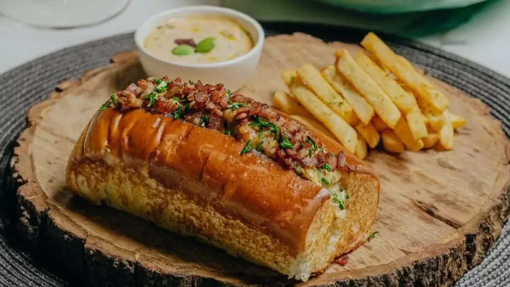 Lobster Roll Recipe seafood snack crayfish recipe how to make lobster roll easy lobster roll recipe quick seafood recipe toasted bun recipe crayfish in butter lobster with mayo Parmesan cheese lobster roll with chives crispy fries recipe easy cooking seafood dish quick lobster snack Rico Goa food lover lobster in butter garlic chili seasoned crayfish how to cook crayfish lobster roll cooking tips best lobster roll homemade lobster roll gourmet snack recipe summer snack ideas