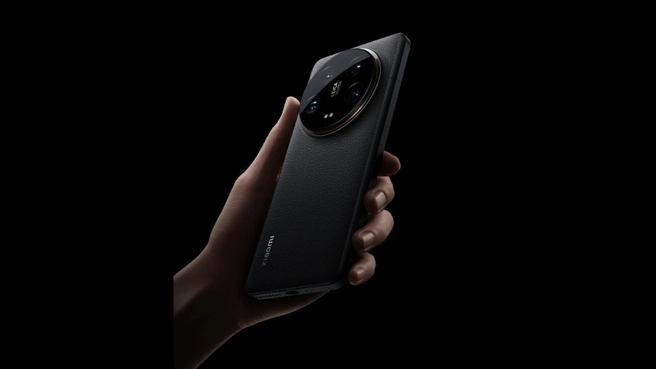 Xiaomi 15 Ultra ceramic glass faux leather Snapdragon 8 Gen 4 quad-curved display 2K resolution circular camera island 50-megapixel sensor Xiaomi flagship launch 2025 Xiaomi 14 Ultra successor Qualcomm chipset new periscope camera ultra-narrow screen rear panel options HyperOS Xiaomi smartphone MWC 2024 quad camera setup Android 14-based Xiaomi phone release Xiaomi India market Xiaomi 14 Ultra price WQHD+ AMOLED display Xiaomi 15 Ultra battery specs Xiaomi IP68 rating Xiaomi phone features Xiaomi camera technology premium smartphone Xiaomi foldable launch Xiaomi specs and details