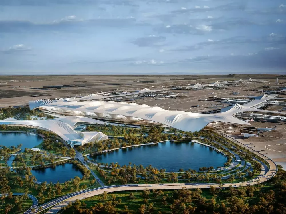 Al Maktoum International Airport expansion Dubai airport revamp Coop Himmelb(l)au architectural design Dhs128 billion project largest airport in the world Dubai World Central passenger comfort advanced design cultural heritage sustainable energy natural daylight renewable energy Jebel Ali area 400 aircraft gates five parallel runways passenger terminal buildings project completion 2032 Dubai Airports CEO Paul Griffiths Dubai Airshow 2050s