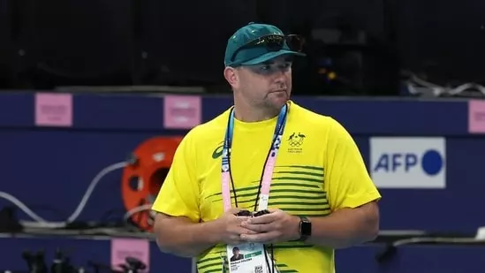 Australian swimming coach Michael Palfrey Swimming Australia dismissed comments Paris Olympics support South Korean swimmer Kim Woo-min men's 400-meter freestyle Australian swimmers Sam Short Elijah Winnington breach employment agreement disrepute reputation coach accreditation status advisor association non-Australian swimmers gold medal Lukas Märtens silver Elijah Winnington bronze Kim Woo-min head swim coach Rohan Taylor un-Australian disappointment unacceptable