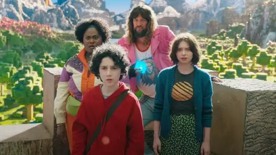 Minecraft movie trailer Jack Black Jason Momoa face Piglins Jared Hess Warner Bros release April 4 2025 Minecraft world The Beatles Magical Mystery Tour Emma Myers Danielle Brooks Sebastian Eugene Hansen Jennifer Coolidge Kate McKinnon Jemaine Clement fantasy adventure film blocky video game universe Minecraft monsters villains creative adventure Overworld cubic wonderland imagination unexpected expert crafter Steve creative skills