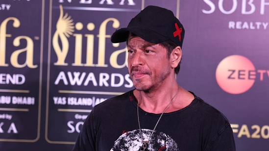 Shah Rukh Khan IIFA 2024 new look short hair Shah Rukh Khan Karan Johar IIFA press conference Mumbai IIFA Awards 2024 Shah Rukh Khan hairstyle IIFA 2024 co-host Shah Rukh Khan Karan Johar IIFA event September 2024 Abu Dhabi IIFA 2024 schedule IIFA Utsavam South Indian film industries IIFA Awards night IIFA Rocks music industry Vicky Kaushal co-host Shah Rukh Khan Dunki Sujoy Ghosh King Suhana Khan