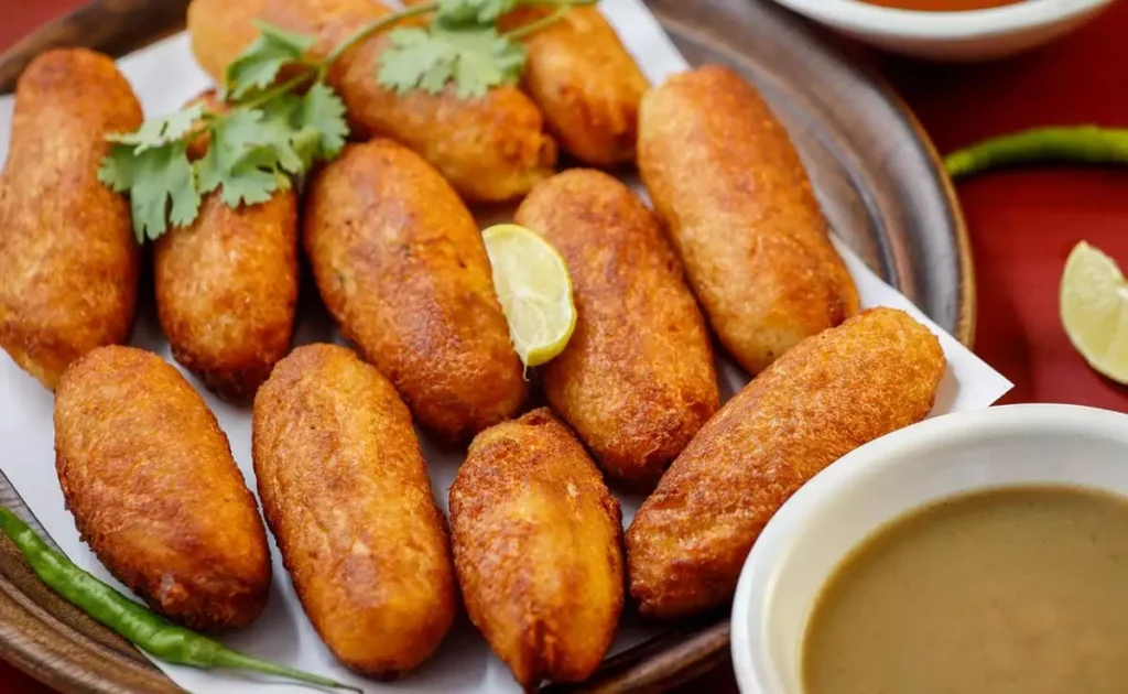 Paneer Schezwan Bread Rolls recipe Indian snacks easy recipes weekend party snacks paneer recipes crispy bread rolls how to make Paneer Schezwan Bread Rolls quick Indian snacks party appetizers paneer snack ideas bread roll recipes Indian party food Schezwan paneer filling shallow fried bread rolls crispy paneer rolls bread snack recipes homemade Schezwan sauce rolls paneer and capsicum filling paneer Schezwan appetizers easy paneer snacks weekend snack ideas party food recipes vegetarian snacks paneer recipes Indian paneer recipes for parties quick bread rolls snacks with paneer tasty paneer rolls