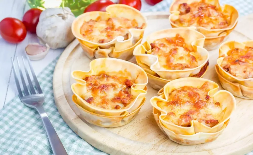 mini lasagna cups lasagna noodles tomato sauce mozzarella cheese mixed vegetables paneer grated easy lasagna recipe bite-sized portions kids meals quick recipes savory snacks oven baked