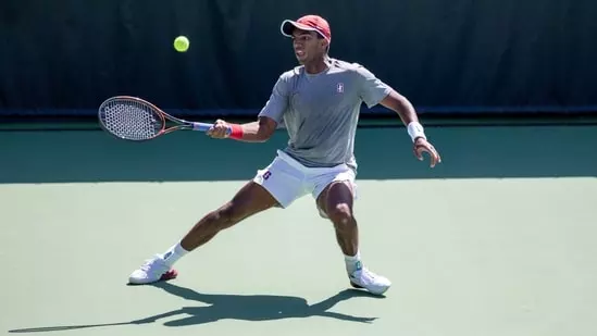 Nishesh Basavareddy Australian Open wildcard Grand Slam debut Indian-origin tennis player Carlos Alcaraz training Challenger events Charlottesville Knoxville Champaign ATP ranking 152nd Stanford