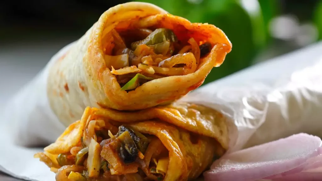 Achari paneer wrap recipe achari paneer kathi roll spicy paneer snack how to make achari paneer quick paneer recipe Indian paneer wrap marinated paneer chunks pickle spice paneer wrap yogurt marinated paneer homemade paneer roll paneer