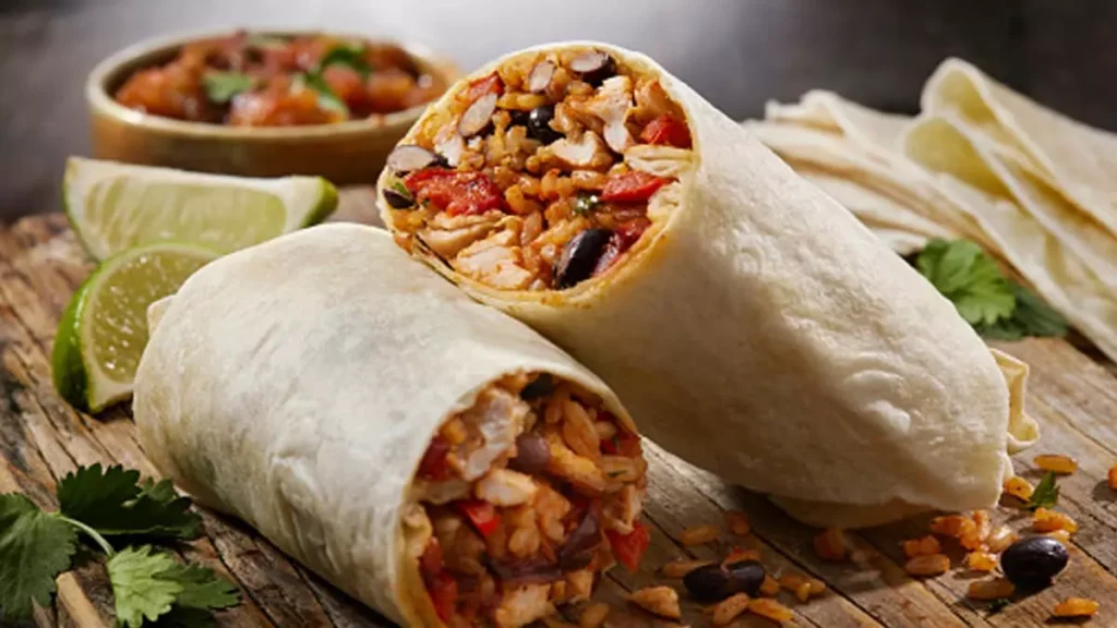 Tandoori chicken burrito recipe easy snack quick snack leftover chicken recipe chicken burrito quick and easy burrito tandoori chicken marinade grilled chicken burrito Indian burrito recipe spicy chicken burrito flavorful chicken burrito yogurt marinade tandoori masala recipe homemade