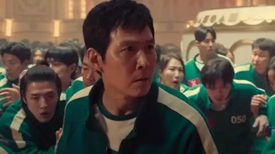 Squid Game season 2 trailer Seong Gi-hun Player 456 deadly survival arena Netflix new season premiere December 26 global hit series returning cast new cast members survival game life-or-death struggle