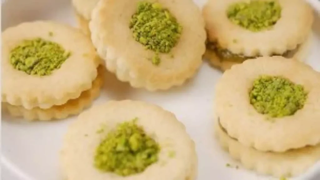 Pistachio jam cookies recipe easy cookie recipes festive cookies Christmas baking recipes pistachio cookie ideas pistachio jam filling homemade cookies for Christmas buttery cookie recipe egg wash cookies pistachio dessert ideas cookie baking guide quick cookie recipe Christmas cookie ideas pistachio jam recipe easy baking ideas Christmas dessert recipes pistachio holiday cookies cookie garnishing ideas egg wash baking tips Christmas treats recipes pistachio caramel cookies cookie baking techniques festive dessert recipes cookie dough preparation holiday cookie ideas pistachio cookie decorations