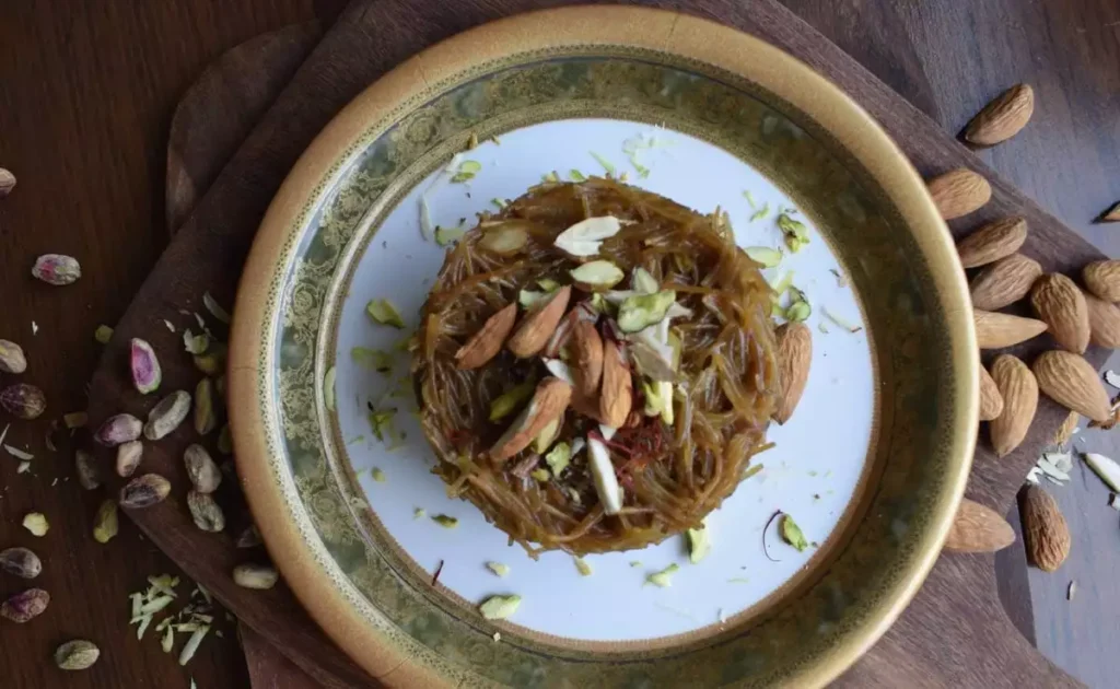 Seviyon Ka Muzaffar recipe traditional Indian desserts Eid special sweets vermicelli pudding recipe how to make sevaiyan dessert festive sweets with khoya best vermicelli sweet recipes easy Indian desserts rich creamy sewaiyan Eid dessert recipes sevai kheer with dry fruits quick sewaiyan recipe homemade vermicelli dessert Indian festival sweets step by step sevaiyan recipe ghee roasted sewaiyan how to cook sweet vermicelli milk-based desserts Indian vermicelli pudding gur sewaiyan recipe classic sewaiyan pudding dry fruit sweet dish jaggery sweet recipe