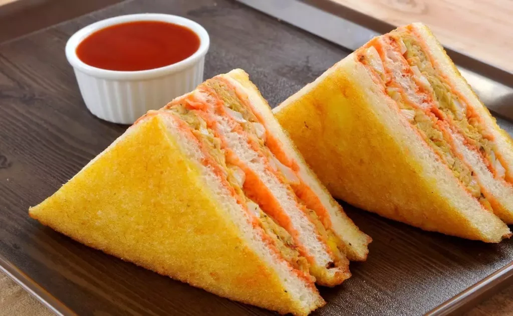 masala chicken egg bhurji sandwich recipe Indian sandwich recipes spicy egg sandwich how to make chicken egg sandwich protein rich sandwich Indian street food style egg sandwich easy chicken sandwich recipes homemade egg bhurji sandwich breakfast sandwich recipes chicken and egg recipes masala scrambled eggs healthy Indian sandwiches Indian snack ideas quick lunch recipes toasted chicken sandwich Indian styl