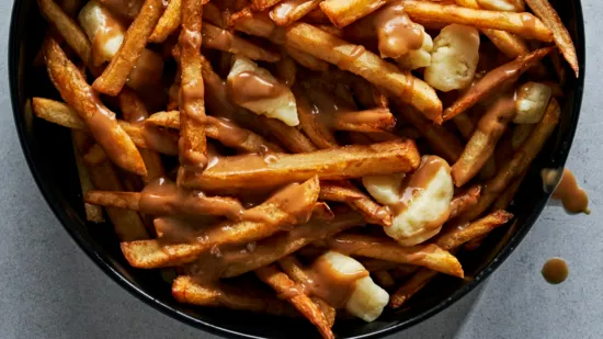Poutine recipe Canadian food fries with cheese curds gravy fries homemade poutine how to make poutine traditional poutine recipe Poutine Day Canadian cuisine Quebec food Canadian comfort food cheese curds and fries gravy recipe chicken gravy for poutine easy poutine recipe best poutine how to fry potatoes crispy fries poutine at home golden French fries poutine sauce recipe homemade gravy white cheddar curds how to make gravy for fries Canadian street food food from Quebec authentic poutine Canadian national dish Poutine Day 2025 April 11 food holidays Canada food celebration Canadian culture in food deep fried potatoes comfort food recipes potato recipes poutine with