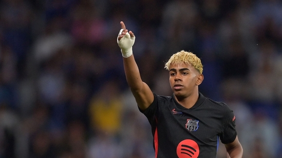 Barcelona La Liga champions 2025 Lamine Yamal goal Barcelona vs Espanyol match result Hansi Flick Barcelona title win Fermin Lopez goal La Liga trophy celebration Barcelona 2-0 Espanyol Lamine Yamal wonder goal teenage football star Spain football news La Liga highlights Barcelona domestic treble Espanyol vs Barcelona match report Real Madrid La Liga standings Yamal goal against Espanyol La Liga title secured La