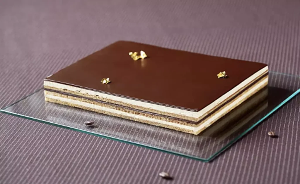 French dessert almond sponge recipe coffee buttercream cake chocolate ganache cake Opera Cake recipe homemade Opera Cake classic French pastry step by step baking guide layered cake recipe gourmet dessert ideas almond flour cake how to make French Opera Cake easy Opera Cake at home Joconde sponge cake recipe professional Opera Cake espresso buttercream chocolate glaze dessert luxury chocolate cake recipe French coffee dessert multi-layer cake cake with coffee soak baking with almond flour elegant dessert