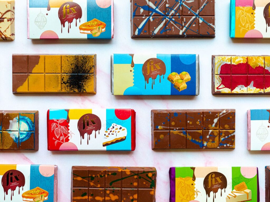 FIX Dessert Chocolatier new chocolate flavor Dubai chocolate kunafa chocolate pistachio chocolate chocolate brownie pecan chocolate Mall of the Emirates chocolate launch June 2025 Dubai dessert Dubai sweets Dubai chocolates Dubai dessert event chocolate bar launch childhood memories chocolate secret
