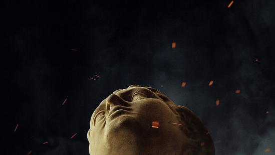 Christopher Nolan The Odyssey poster leak Matt Damon The Odyssey Tom Holland in The Odyssey Defy the Gods tagline Nolan epic IMAX film only IMAX cameras used AMC theatres The Odyssey release date July 17 2026 ancient Greek god statue severed head poster The Odyssey theme Defying the Gods Nolan historical