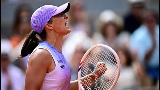 Iga Swiatek French Open 2025 Elena Rybakina comeback win Swiatek vs Rybakina Roland Garros Swiatek quarter-final Elina Svitolina tennis news Paris Grand Slam Swiatek Rybakina match score Swiatek emotional reaction Swiatek doping suspension Swiatek 2024 controversy Swiatek form struggle Swiatek top spin rallies