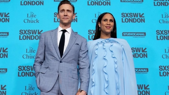 Zawe Ashton baby bump Tom Hiddleston second child Zawe Ashton pregnant Tom Hiddleston The Life of Chuck UK premiere Zawe Ashton red carpet appearance Emilia Wickstead gown SXSW London event Zawe Ashton pregnancy 2025 celebrity pregnancy news Tom Hiddleston baby news Marvel actor baby