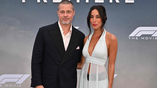 Brad Pitt Ines de Ramon Brad Pitt red carpet Brad Pitt body language Brad Pitt relationship news Brad Pitt F1 premiere Ines de Ramon fashion Brad Pitt age gap Brad Pitt anxious body language celebrity couple analysis Brad Pitt Ines de Ramon red carpet Judi James expert opinion Brad Pitt fashion choices Brad Pitt inner anxiety Ines de Ramon confident appearance Hollywood couples 2025 Brad Pitt nervous signs red ca