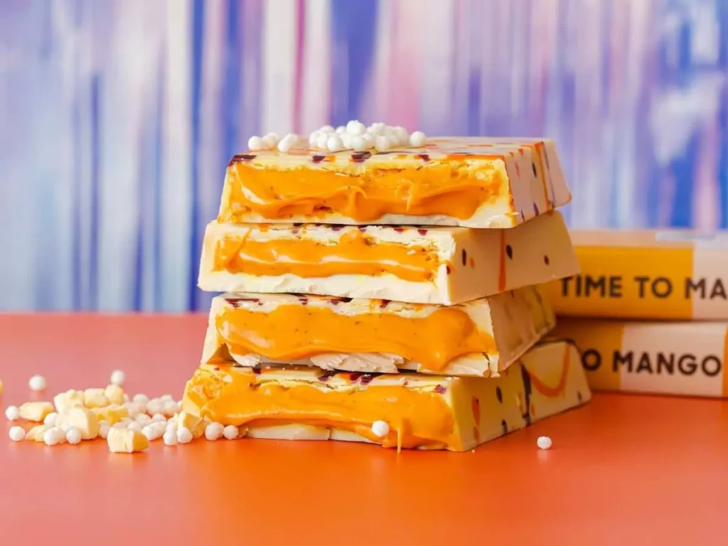 Dubai chocolate FIX Dessert Chocolatier Time to Mango white chocolate bar Dubai dessert brand mango chocolate bar passionfruit chocolate Dubai sweet shop Dubai pop-up event Mall of the Emirates dessert launch FIX new flavour Dubai chocolate update chocolate bar with popping candy Dubai confectionery