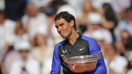 Rafael Nadal French Open 2017 Nadal La Decima tennis racquet auction record-breaking sports memorabilia Babolat racquet Nadal auction Prestige Memorabilia most expensive racquet Roland Garros 2017 Nadal vs Wawrinka Nadal straight sets Nadal racquet with Rafa emblem Nadal retirement 2024 Nadal Court Philippe Chatrier Nadal farewell ceremony Nadal emotional tribute Merci Rafa shirts Nadal clay court dominance