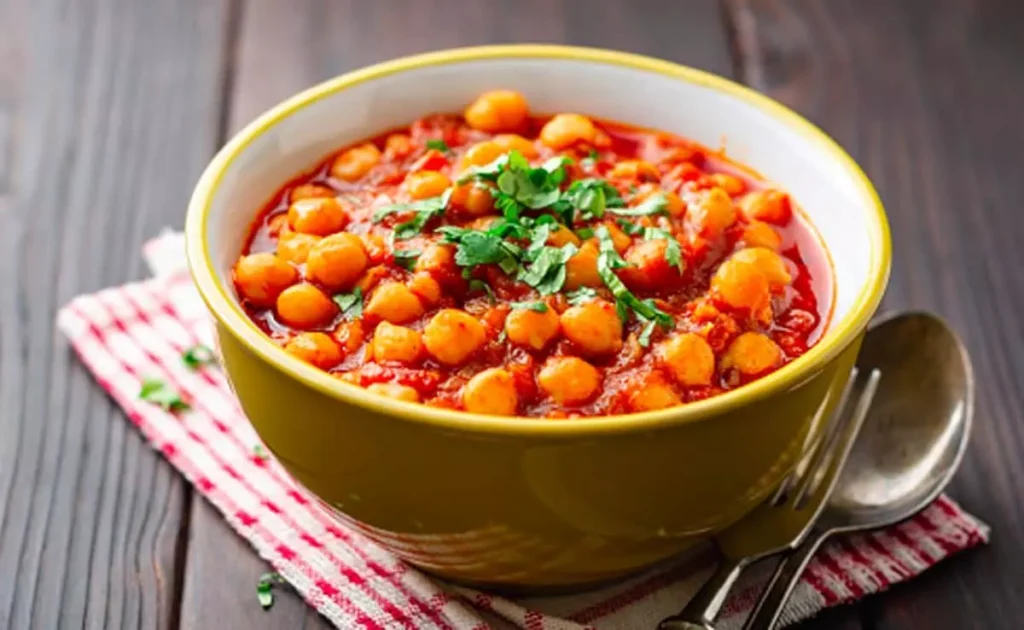 chickpea tikka masala recipe how to make chickpea tikka masala vegetarian Indian curry easy chickpea tikka masala homemade tikka masala with chickpeas chickpeas curry recipe Indian vegetarian dinner best Indian recipes creamy chickpea curry marinated chickpeas tikka masala gravy Indian food for dinner vegan tikka masala Indian chickpea recipes spicy chickpea curry Indian creamy curry recipes chickpeas with yogurt and