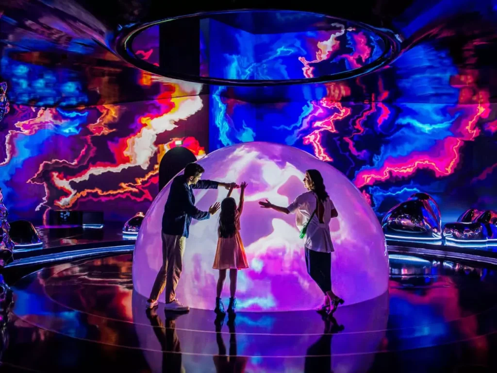 Aya Universe Dubai immersive experience multisensory attraction Wafi City Dubai cosmic adventure Dubai family activities Dubai things to do Dubai summer events UAE residents offer Aya Universe discount ticket cosmic rainforest glowing galaxy immersive ball pit infinity mirror rooms reverse waterfalls space projections interactive zones Drift Tides Outland The Source Harmonia light and sound show Aya Universe ticket booking online Emirates ID offer UAE Pass entry multisensory art installation Dubai tourist attractions Dubai