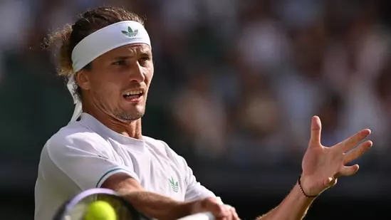 Alexander Zverev Wimbledon loss Zverev knocked out Wimbledon 2025 Arthur Rinderknech beats Zverev Wimbledon first round upset Zverev Grand Slam early exit Wimbledon tennis results Zverev vs Rinderknech score Wimbledon match suspension overnight Wimbledon Centre Court thriller Zverev unseeded Frenchman win Wimbledon tennis news today Zverev shocking defeat Wimbledon five set match Zverev Wimbledon