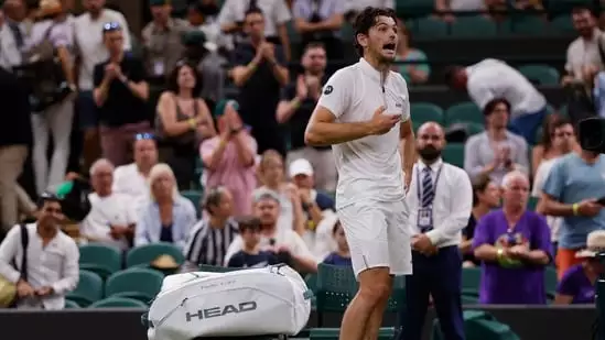 Wimbledon 2025 Taylor Fritz match suspended Wimbledon curfew rule Wimbledon match delays Taylor Fritz Giovanni Mpetshi Perricard Wimbledon latest updates Wimbledon first round results Wimbledon Court 1 drama Wimbledon crowd boos Wimbledon player reactions Wimbledon night session curfew Wimbledon officials decision Taylor Fritz Wimbledon comeback Fritz vs Perricard result Wimbledon latest tennis news