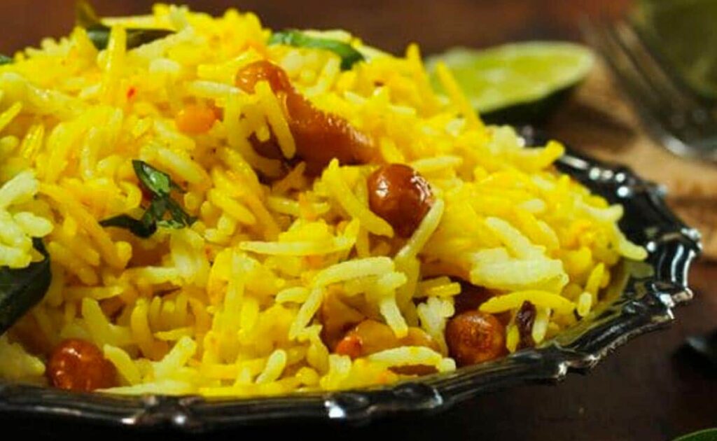 cucumber rice recipe South Indian cucumber rice easy rice dish summer lunch ideas healthy rice recipe how to make cucumber rice Indian rice dish simple rice recipe vegetarian lunch recipe grated cucumber recipes quick lunch recipes coconut rice variation Indian vegetarian meals summer rice meals Indian lunch box ideas