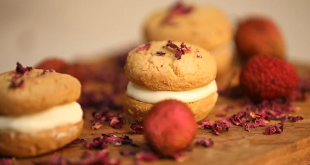 rose and litchi ganache butter cookies rose cookies recipe litchi cookies recipe butter cookies with ganache easy butter cookies recipe festive cookies recipe homemade cookies recipe rose extract cookies litchi pulp cookies white chocolate ganache cookies cookies for Father’s Day cookies for gifting how to make butter cookies easy cookie baking recipe unique cookie recipe rose flavored cookies litchi dessert recipe tea time cookies crispy butter cookies sandwich cookies recipe chocolate ganache filling cookies fruity cookies floral cookies cookies with cream filling homemade festive treats rose ganache cookies recipe oven baked cookies step by step cookies recipe cookies with milk and butter bakery style butter cookies crispy rose cookies litchi sweet recipes cookies for kids cookies for family gathering buttery melt in mouth cookies