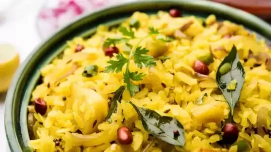 Navratri fasting recipes Navratri vrat recipes aloo ke pohe recipe aloo pohe for fasting aloo pohe recipe easy aloo pohe recipe vrat friendly recipes Indian fasting food recipes healthy Navratri recipes carb rich fasting recipe vegetarian fasting recipe Maharashtrian aloo ke pohe recipe potato pohe recipe easy vrat recipes Navratri breakfast recipes Navratri lunch recipes simple aloo pohe recipe Navratri snack recipes potato julienne recipe Indian vrat recipe coriander garnish pomegranate garnish lemon juice recipe healthy carb recipes quick fasting meals Navratri meal ideas Navratri food ideas traditional Indian fasting recipes potato vrat recipe spicy aloo pohe recipe green chili recipes curry leaf recipe cumin seed recipe sendha namak recipes red chili powder recipe vegetarian Navratri recipes festive vrat recipes family vrat recipes easy Indian