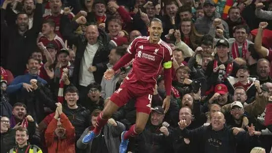 Liverpool vs Atletico Madrid Champions League Liverpool late goals Virgil van Dijk header Liverpool stoppage time winner Mohamed Salah goal Liverpool Anfield atmosphere Liverpool Champions League highlights Liverpool comeback win Arne Slot Liverpool coach Liverpool vs Atletico Madrid 2025 Atletico Madrid vs Liverpool results Liverpool football news UEFA Champions League late drama Liverpool attacking football Liverpool victory Anfield Liverpool vs Atletico live match Liverpool score updates Virgil van Dijk goal