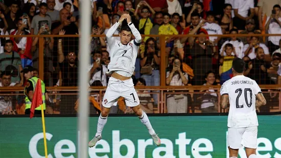 Cristiano Ronaldo goals Cristiano Ronaldo Portugal Ronaldo vs Messi Ronaldo World Cup qualifiers record Ronaldo surpasses Messi Portugal vs Armenia Ronaldo international goals Ronaldo wonder goal Ronaldo brace Yerevan Stadium Portugal win 5-0 Ronaldo at 40 Ronaldo record breaking goals Ronaldo World Cup qualification Ronaldo football legend Messi vs Ronaldo rivalry Portugal World Cup campaign Joao Felix goals Joao Cancelo goal Portugal national team UEFA qualifiers Ronaldo historical record Ronaldo football history Ronaldo vs Carlos Ruiz Ronaldo international football record Portugal Hungary qualifier Ronaldo greatest