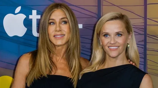 Jennifer Aniston reaction Reese Witherspoon real name Reese Witherspoon Laura Jean Reese Witherspoon stage name Jennifer Aniston The Morning Show season four Apple TV celebrities with stage names Emma Stone real name Tom Cruise real name Helen Mirren real name Lady Gaga real name Nicolas Cage real name Hollywood stars stage names why actors change names funny celebrity reactions celebrity trivia Reese Witherspoon interview Jennifer Aniston surprised Reese Witherspoon full name Reese Witherspoon mother