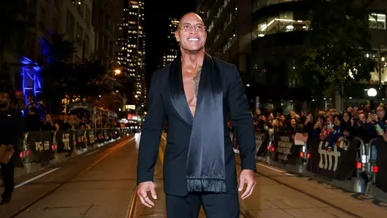 Dwayne Johnson The Smashing Machine Dwayne Johnson biopic The Rock new movie Mark Kerr biopic UFC champion film Benny Safdie movie Dwayne Johnson emotional role Dwayne Johnson Venice Film Festival Dwayne Johnson acting transformation The Rock drama movie Emily Blunt The Smashing Machine Emily Blunt and Dwayne Johnson UFC movie 2025 The Smashing Machine release date A24 The Smashing Machine Mark Kerr story Dwayne Johnson acting range The Rock emotional acting Dwayne Johnson childhood