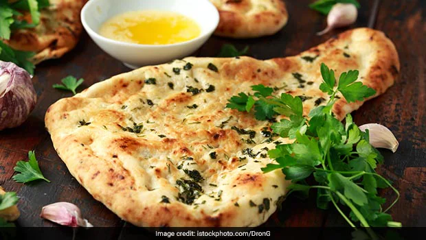 tandoori garlic naan recipe garlic naan recipe homemade garlic naan tandoori naan recipe Indian flatbread recipe naan without tandoor wheat flour naan recipe soft naan recipe easy garlic naan naan on tawa naan on pan restaurant style garlic naan naan without yeast naan without oven butter garlic naan spicy garlic naan naan with green chillies naan dough recipe Indian bread recipe naan with atta how to make naan easy naan recipe naan at home naan with wheat flour naan for curry Indian garlic naan naan for dal naan making recipe naan cooking tips naan in tandoor naan Indian food soft Indian naan Indian flatbread with garlic naan step