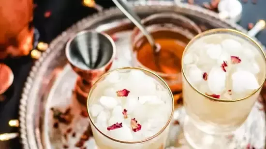 Diwali rose cardamom cocktail Diwali cocktail rose cardamom drink festive cocktail floral cocktail cardamom cocktail gin cocktail rose lemonade cocktail Diwali party drinks festive beverage Diwali drinks recipe rose cordial cardamom bitters cocktail Christmas party cocktail holiday cocktail floral gin cocktail rose cocktail recipe Diwali celebration drinks party drinks cocktail recipe easy cocktail cardamom rose syrup cocktail rose