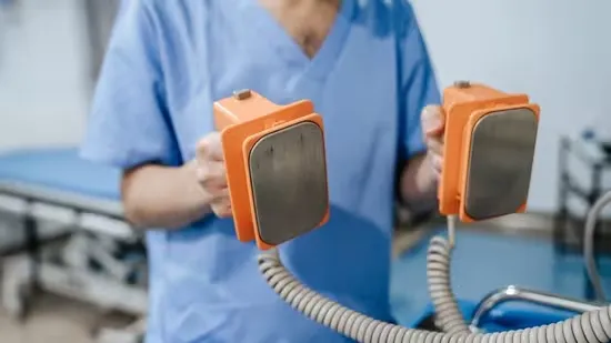 AED automated external defibrillator sudden cardiac arrest Dr Jeremy London cardiothoracic surgeon life saving devices cardiac emergency survival tips public safety AED usage heart rhythm heart health emergency response CPR defibrillator instructions airports gyms schools public spaces heart collapse rapid response electrical shock depolarize heart heart pacemaker save lives quick action cardiac arrest awareness heart safety AED guide defibrillation survival rate heart resuscitation heart emergency medical device heart