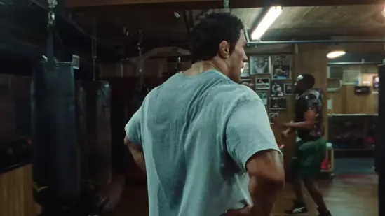 Christopher Nolan Dwayne Johnson The Smashing Machine Christopher Nolan podcast Christopher Nolan interview Dwayne Johnson performance Dwayne Johnson best acting role Christopher Nolan praises Dwayne Johnson The Smashing Machine movie review Mark Kerr Dwayne Johnson Mark Kerr movie Benny Safdie The Smashing Machine director Emily Blunt The Smashing Machine cast Dwayne Johnson dramatic role The