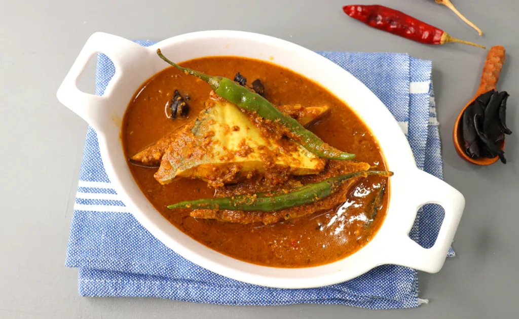 Sindhi Fish Curry recipe authentic Sindhi fish curry king fish curry homemade fish curry easy fish curry spicy fish curry garlic tomato fish curry green chilli fish curry coriander fish curry traditional Sindhi cuisine Sindhi recipes Indian fish recipes fish curry recipe family dinner fish curry quick fish curry step by step fish curry healthy fish curry flavorful fish curry restaurant style fish curry Indian cuisine seafood curry curry with rice curry with roti Punjabi fish curry fish masala recipe seafood recipes fish dishes Indian seafood recipes curry