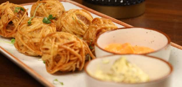 crispy chicken tortilla balls recipe chicken tortilla balls appetizer easy chicken balls recipe party snacks quick dinner party appetizers crunchy chicken bites mozzarella stuffed chicken balls sriracha sauce dipping sauce mustard mayonnaise homemade chicken balls tortilla coated chicken balls French fries side dish easy cooking chicken appetizers fast snack recipe chicken snack ideas juicy chicken balls cheese stuffed chicken balls golden brown chicken balls deep fried chicken tortilla balls kids friendly snack spicy dipping sauce creamy dipping sauce easy appetizer recipe chicken finger food cheese filling snack recipes gourmet chicken