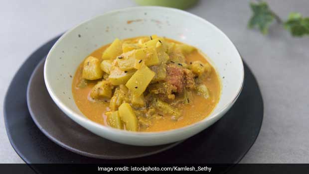 Lau Dalma recipe Odia Lauki Dal Lauki moong dal potato cubes turmeric powder ghee cumin seeds dry red chili grated ginger roasted cumin powder grated coconut coriander leaves healthy Odia recipe Indian dal recipe vegetarian Indian curry Odia cuisine traditional Odia dish simple Indian dal easy Indian recipe step by step cooking instructions Lauki dal Odia dal Lau Dalma with potatoes Lau Dalma with bottle gourd Indian