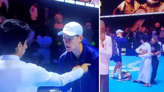 Jannik Sinner Riyadh Jannik Sinner fan incident Six Kings Slam Riyadh 2025 Jannik Sinner vs Stefanos Tsitsipas Novak Djokovic Six Kings Slam tennis Saudi Arabia Jannik Sinner match security breach tennis court invasion viral tennis news Riyadh sports event Jannik Sinner semifinal Novak Djokovic tennis Saudi Arabia sports news Jannik Sinner jacket incident tennis safety concerns Monica Seles reference Jannik Sinner calm reaction Jannik Sinner viral moment tennis Riyadh championship tennis exhibition Riyadh Saudi tennis