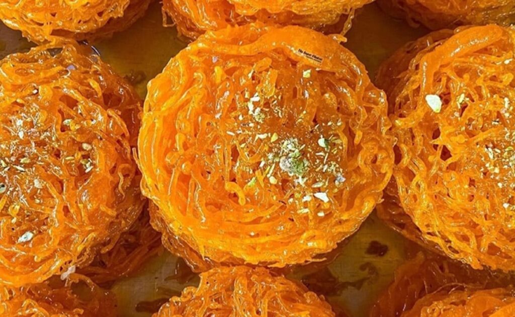 Sindhi Gheeyar recipe traditional Indian sweets Sindhi dessert Gheeyar recipe crispy sweet Indian Gheeyar Sindhi festival sweets homemade Gheeyar Sindhi cuisine Indian festive recipes easy Indian dessert recipes Gheeyar sugar syrup cardamom flavored sweets Sindhi food culture sweet dish from Sindh Indian traditional cooking Gheeyar ingredients Gheeyar method sweet recipes Indian festive food Indian mithai Sindhi special dish how to make Gheeyar sweet snack from Sindh Indian dessert preparation step by step Gheeyar recipe crispy Indian sweets authentic Sindhi recipes festival sweet recipe easy homemade sweets Indian traditional