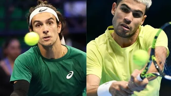 Lorenzo Musetti Carlos Alcaraz ATP Finals Turin ATP Finals match Musetti vs Alcaraz ATP tennis news year end number one Alcaraz ranking battle Jannik Sinner tennis tournament Turin tennis Musetti victory Alex de Minaur Taylor Fritz Novak Djokovic withdrawal ATP standings Musetti home crowd support Alcaraz three wins ATP group stage tennis semi final race world number one chase ATP season finale Italian tennis star Spanish tennis star ATP top players hard court tennis ATP match preview tennis headlines ATP Finals update