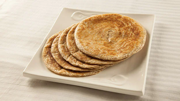 Butter chicken kulcha recipe Indian fusion snack Punjabi food stuffed kulcha easy chicken recipe creamy chicken kulcha street food style tawa kulcha chicken kulcha homemade kulcha filling party snack idea quick dinner recipe Indian snacks butter chicken filling restaurant style kulcha lunchbox idea North Indian flavours juicy chicken recipe spicy chicken kulcha Indian food guide easy cooking recipe chicken lovers recipe kulcha twist best Punjabi dishes homemade butter chicken fast lunch ideas casual dinner recipe oven free cooking